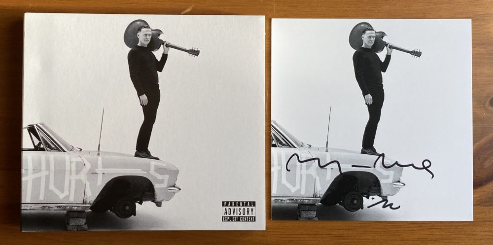 Lot 202: Bryan Adam signed So Happy it Hurts CD...