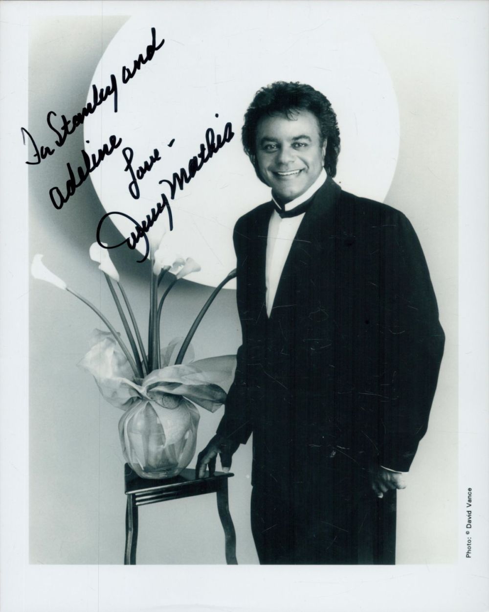 Lot 240: Johnny Mathis signed 10x8 inch black and white...