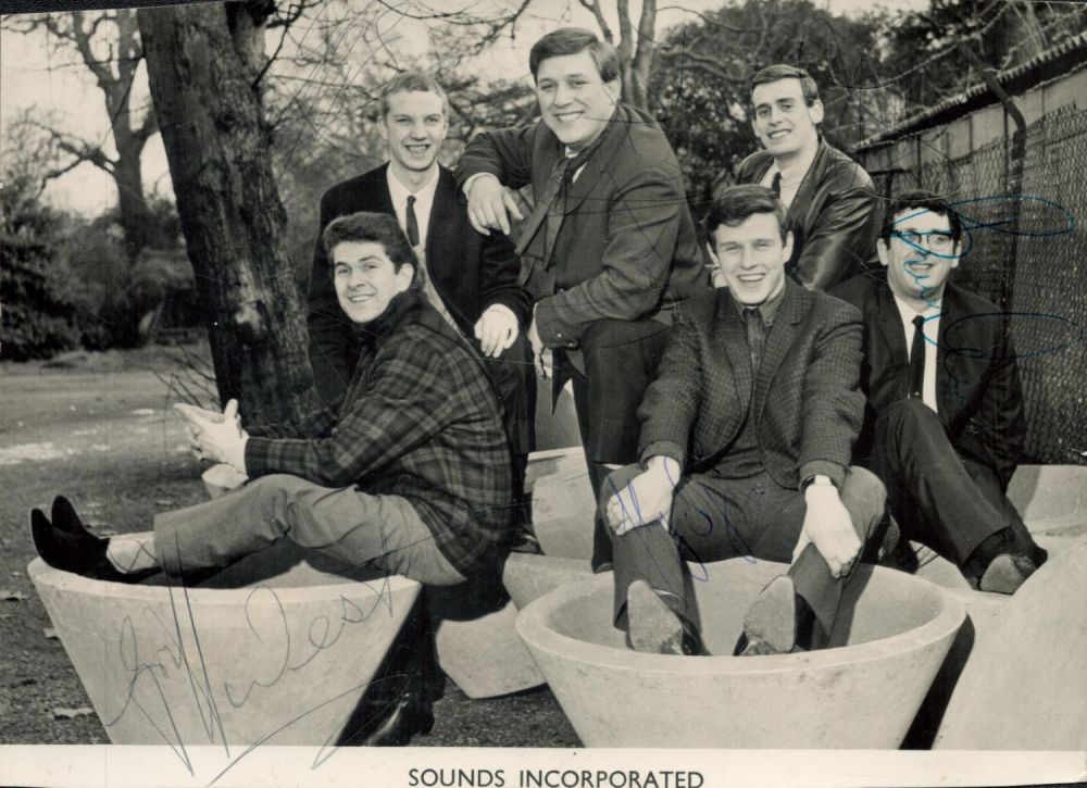 Lot 686: Sounds Incorporated multi signed 8x6 inch black and...