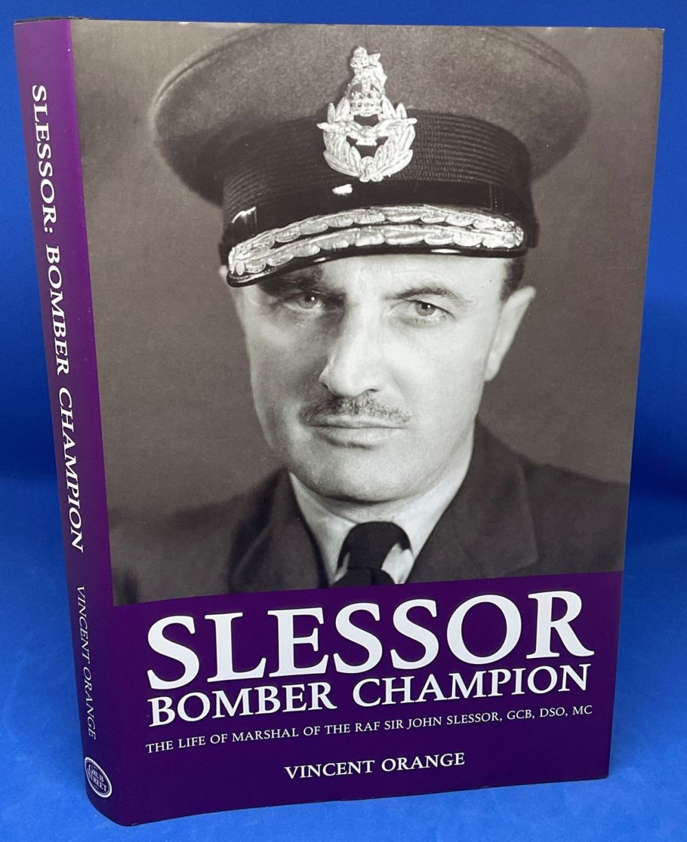Lot 566: Vincent Orange Hardback Book titled Slessor Bomber Champion-...