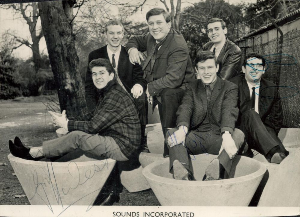 Lot 395: Sounds Incorporated multi signed 8x6 inch black and...