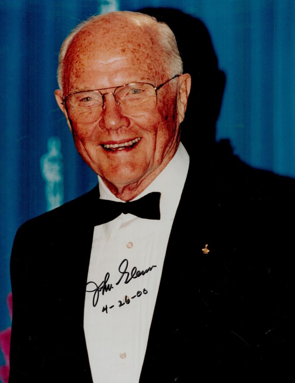Lot 403: John Glenn signed 10x8inch colour evening suit photo....