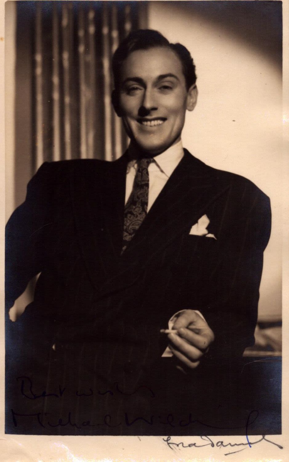 Lot 339: Michael Wilding signed 6x4inch sepia photo. Good condition....