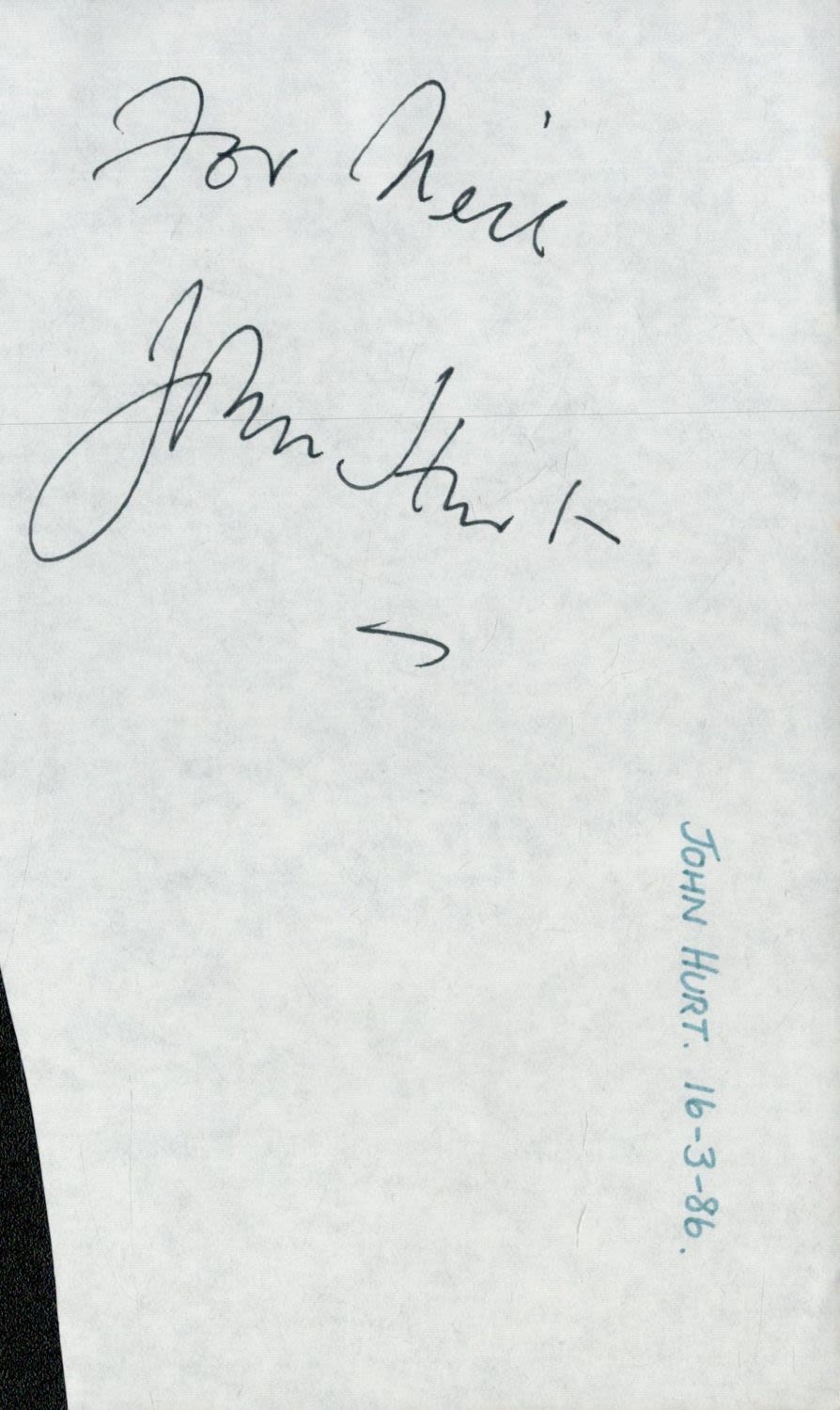 Lot 390: John Hurt irregular cut signature piece. Good condition....