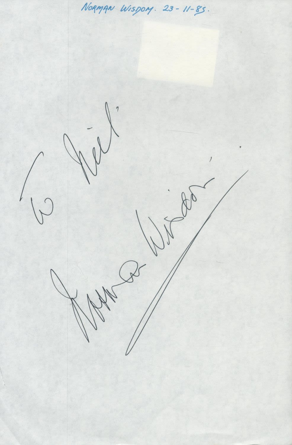 Lot 413: Norman Wisdom large signature on A4 page. Dedicated....