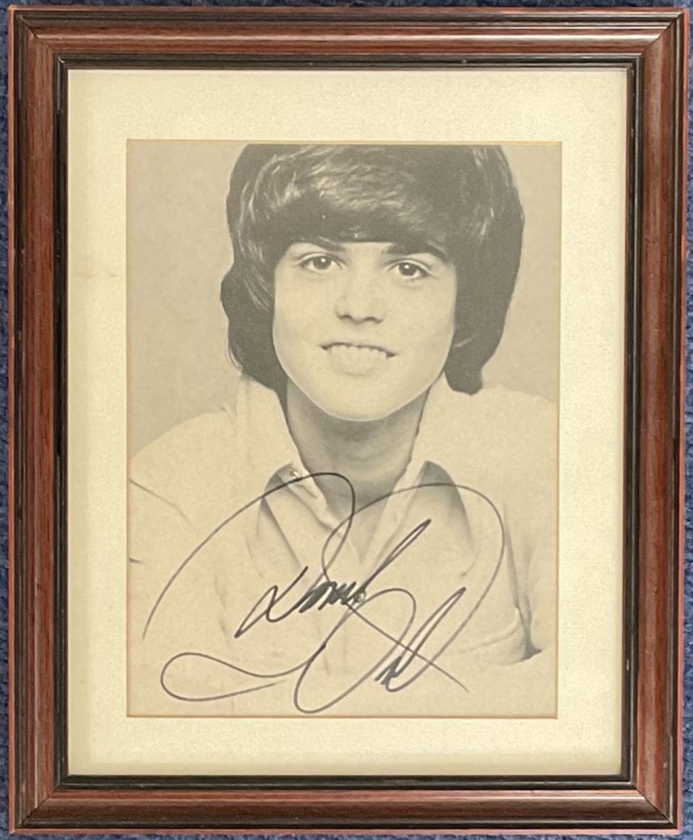 Lot 599: Music. Donny Osmond Signed black and white image,...