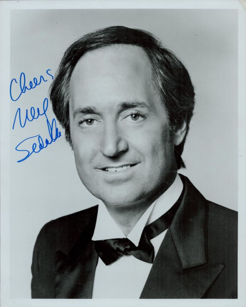 Lot 190: Neil Sedaka Singer Signed 8x10 Photo. Good condition....