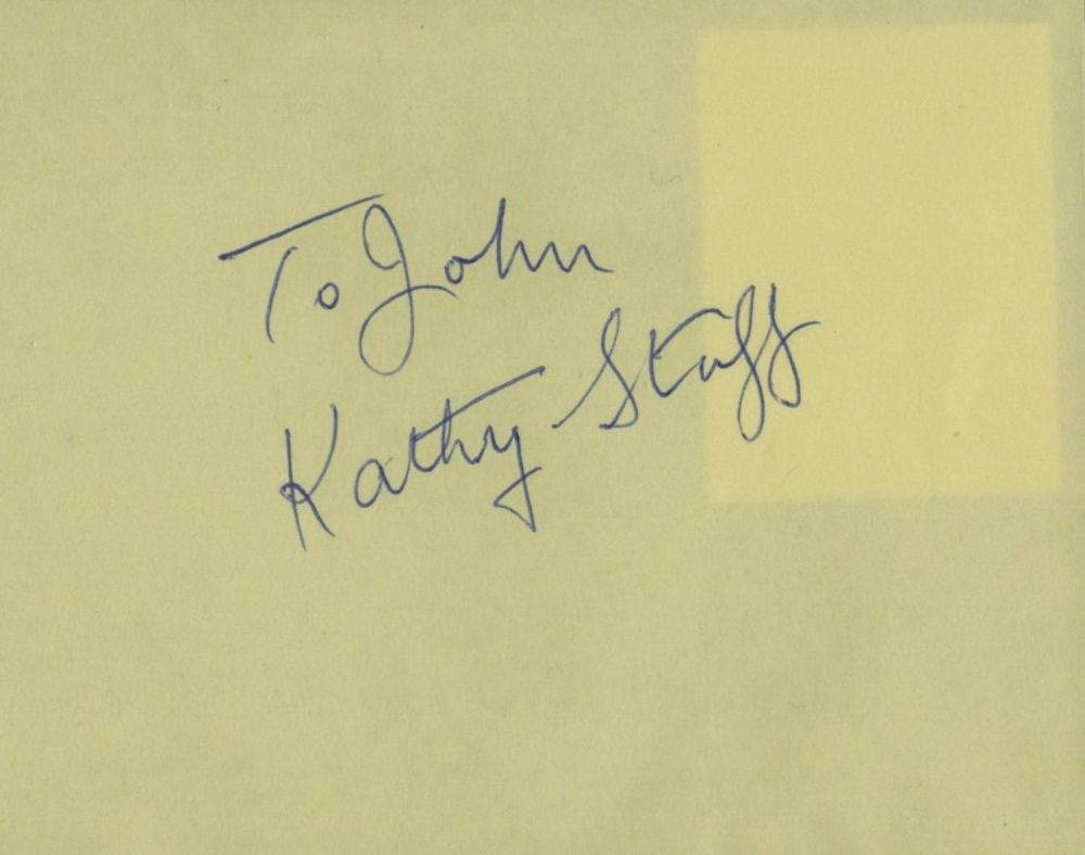 Lot 230: Kathy Staff signed yellow 6x4 album page. Good...