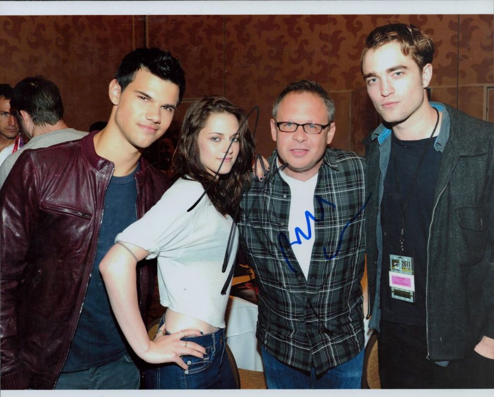 Lot 265: Taylor Lautner and Bill Condon signed 10x8 colour...