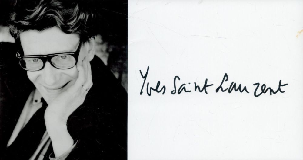 Lot 60: Yves Saint Laurent signed 8x4 inch black and...