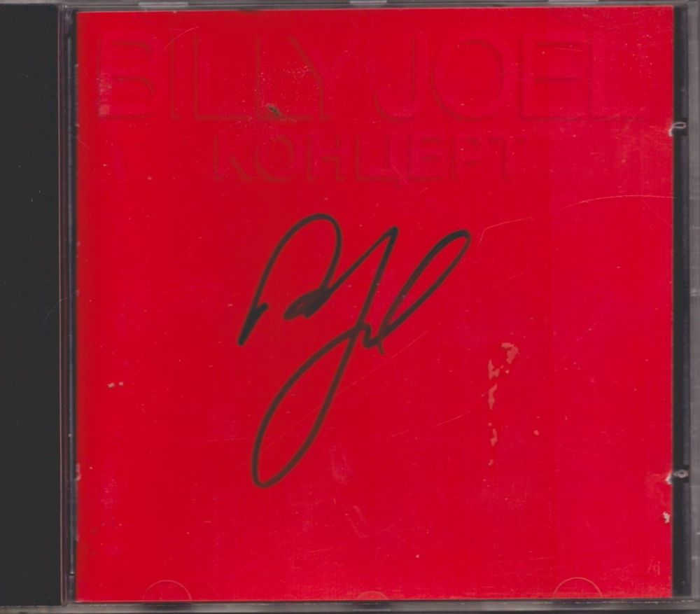 Lot 69: Billy Joel signed Kohueft CD sleeve disc included....