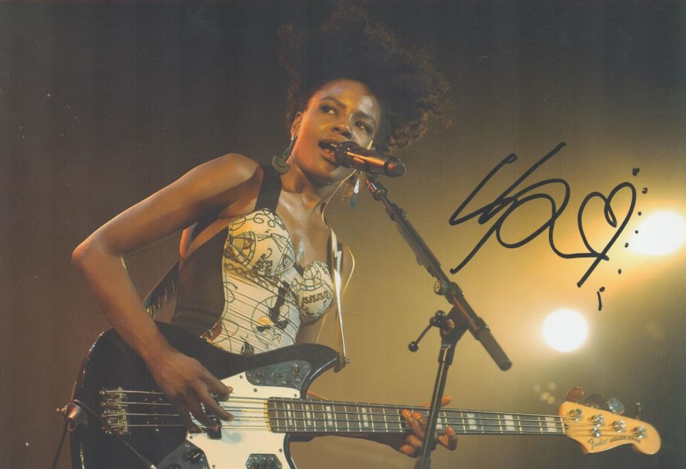 Lot 65: Nina Nesbitt signed 10x8 colour photo. Nesbitt is...