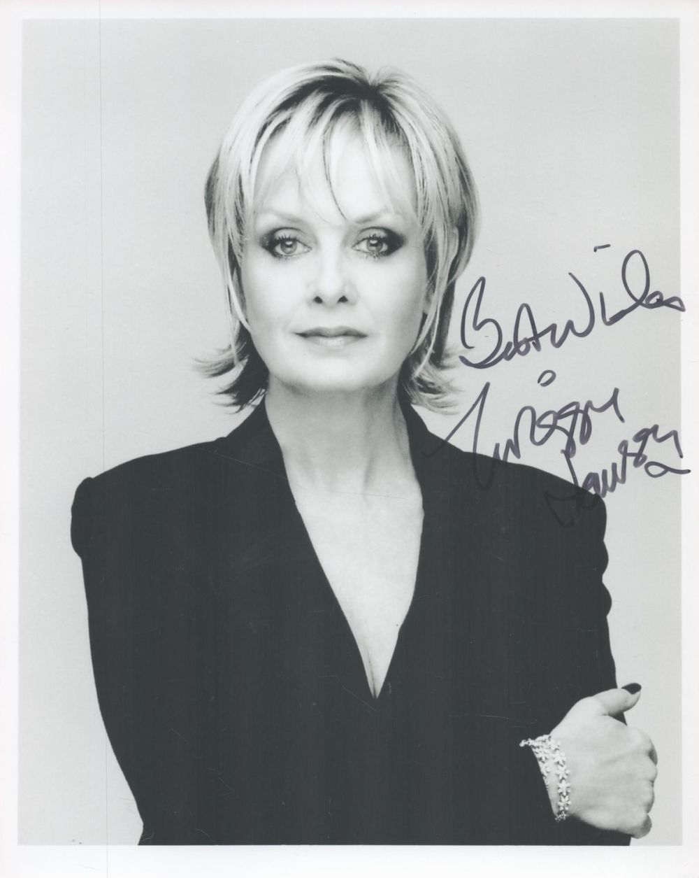 Lot 95: Model, Twiggy signed 10x8 black and white photograph....