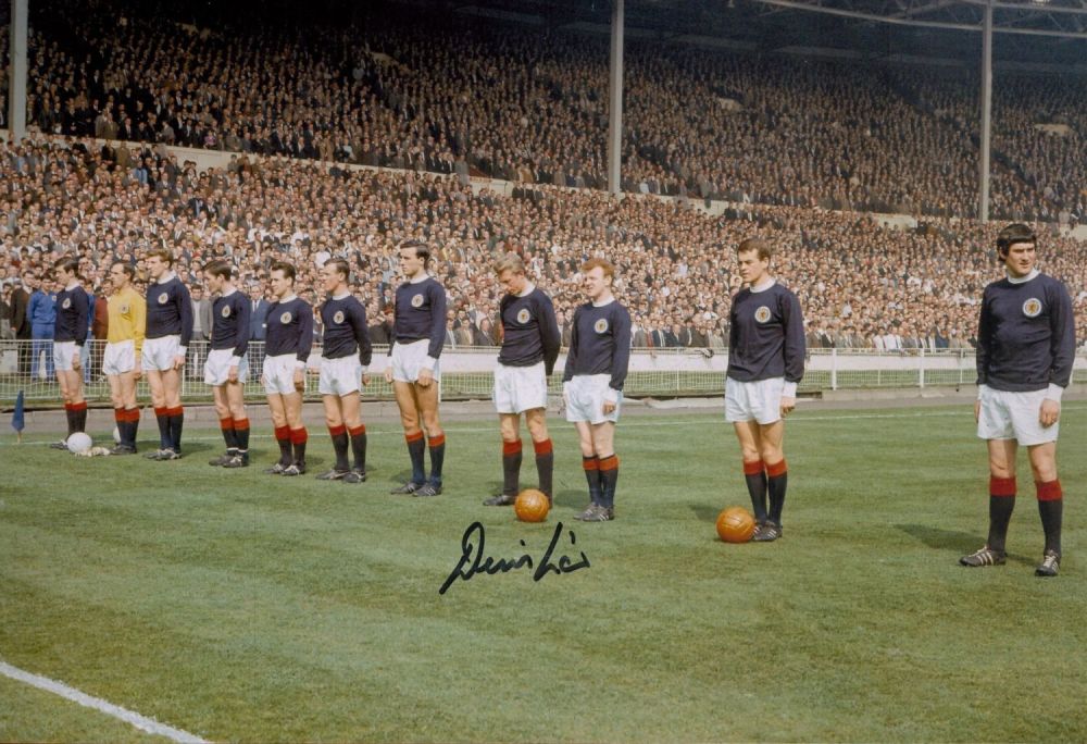 Lot 97: Denis Law signed 12x8 colour photo pictured lining...