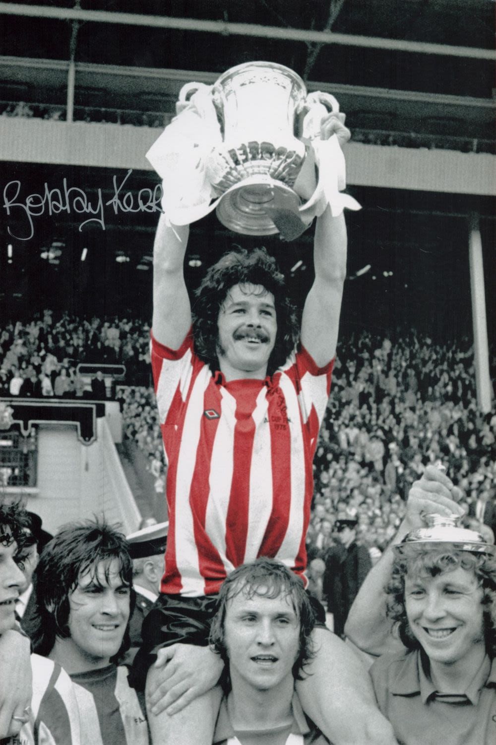 Lot 103: Bobby Kerr signed 12x8 colourised photo pictured celebrating...