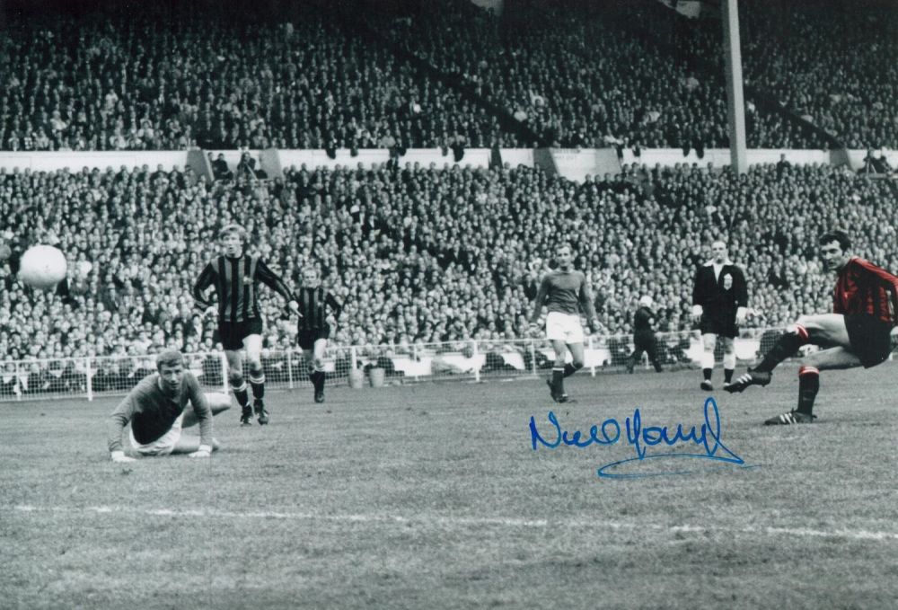 Lot 112: Neil Young signed 12x8 colourised photo pictured scoring...