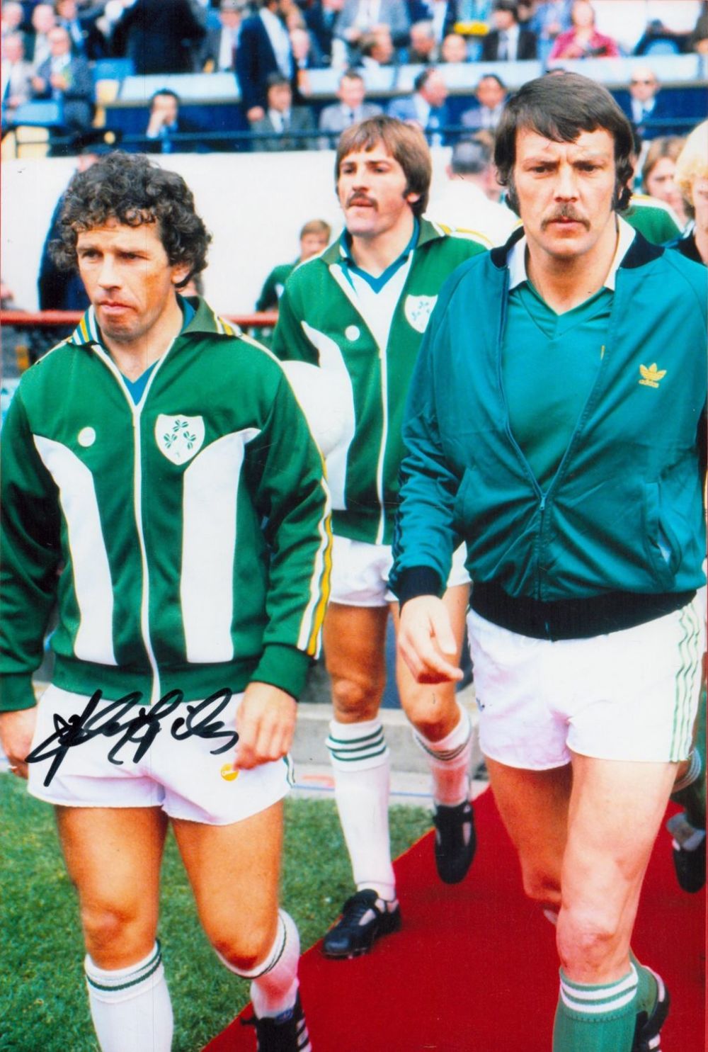 Lot 115: Johnny Giles signed 12x8 colour photo pictured leading...