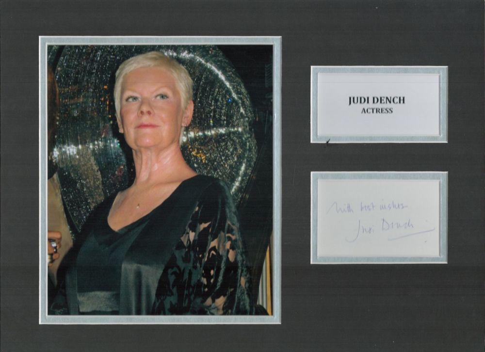 Lot 124: Judi Dench 16x12 mounted signature piece. Dench CH...