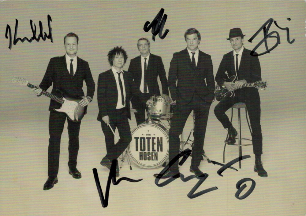 Lot 236: Die Toten Hosen multi signed 6x4inches black and...