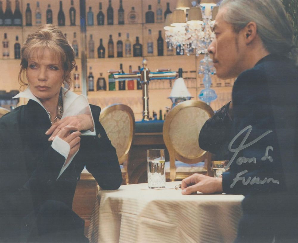 Lot 241: Tom So signed James Bond 10x8 inches colour...