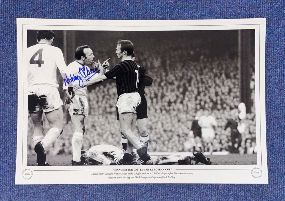 Lot 458: Football. Nobby Stiles Signed 18x12 black and white...