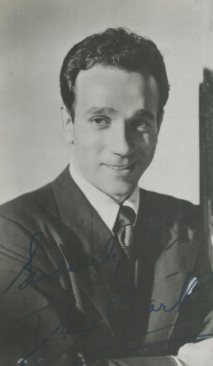 Lot 131: Dane Clark signed vintage black & white photo....