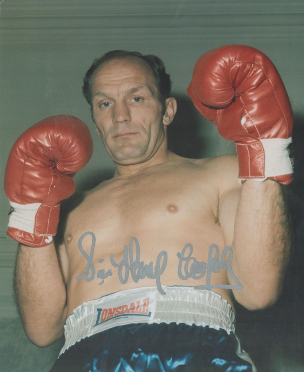 Lot 219: Sir Henry Cooper signed 10x8 colour photo. Sir...
