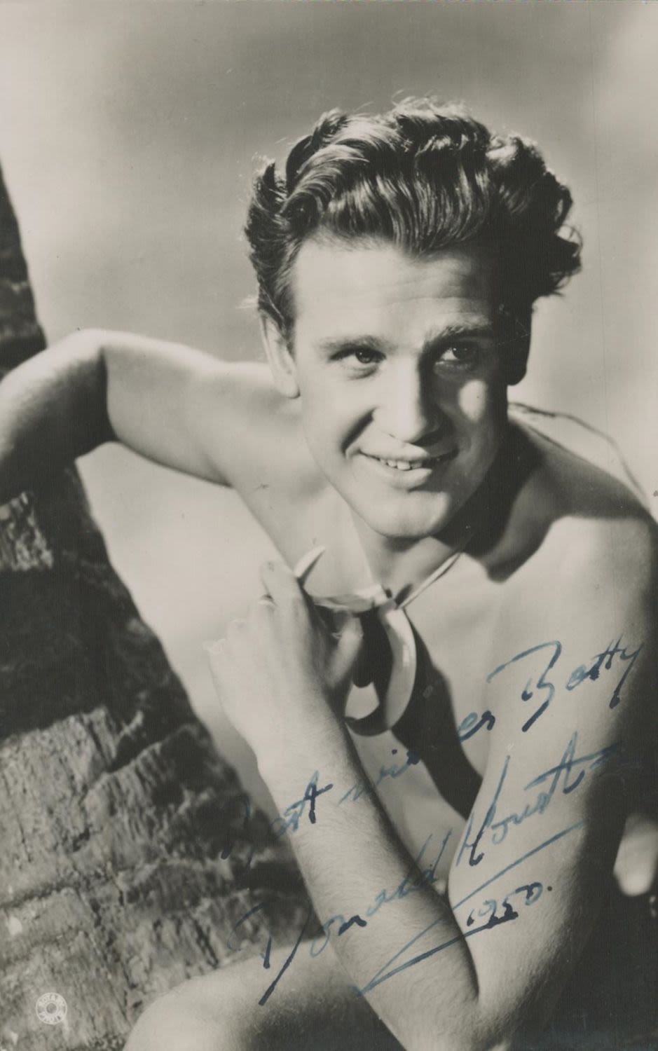 Lot 253: Donald Houston signed black & white photo. Dedicated....