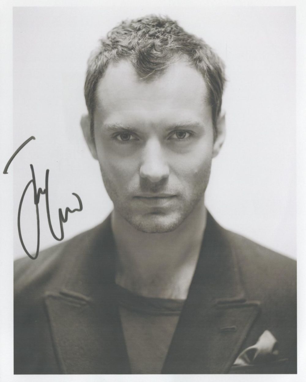 Lot 366: Jude Law signed 8x6inch black and white photo....