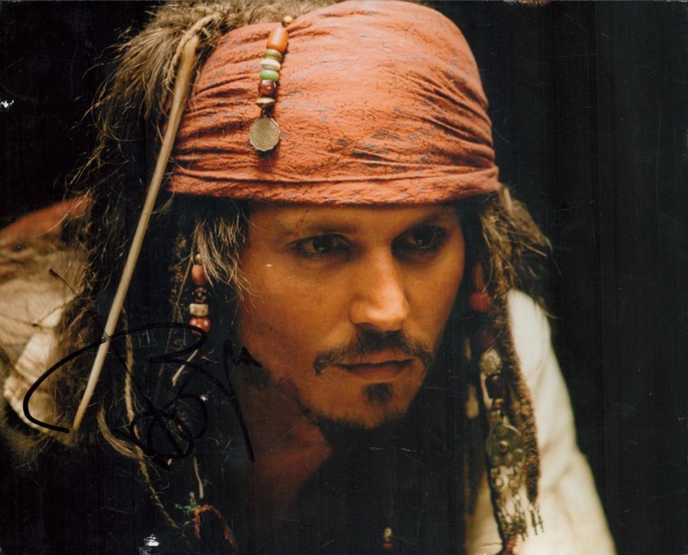 Lot 152: Johnny Depp signed 10x8 inch Pirates of the...