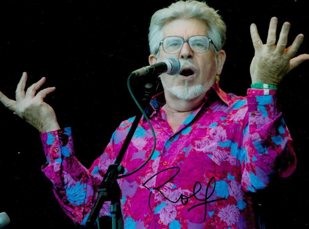 Lot 230: Rolf Harris signed 12x8 inch colour photo. Good...