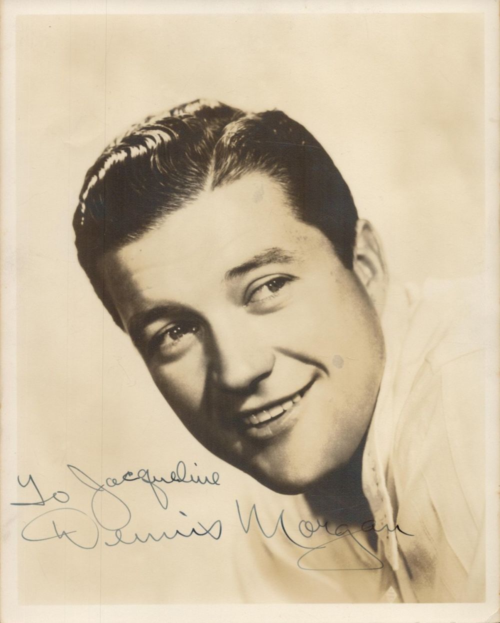 Lot 245: Dennis Morgan signed 10x8 inch sepia vintage photo...
