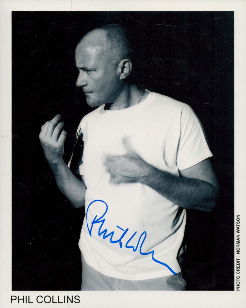 Lot 106: Phil Collins signed 10x8 inch black and white...