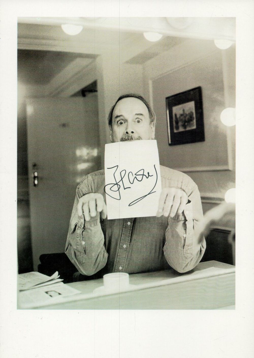 Lot 229: John Cleese signed 8x6 inch approx black and...