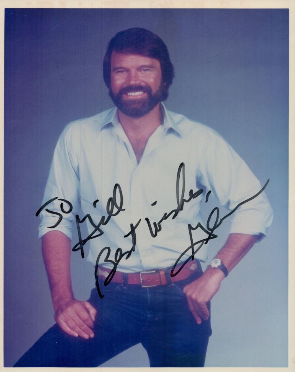 Lot 231: Glen Campbell signed 10x8inch colour photo. Dedicated. Good...