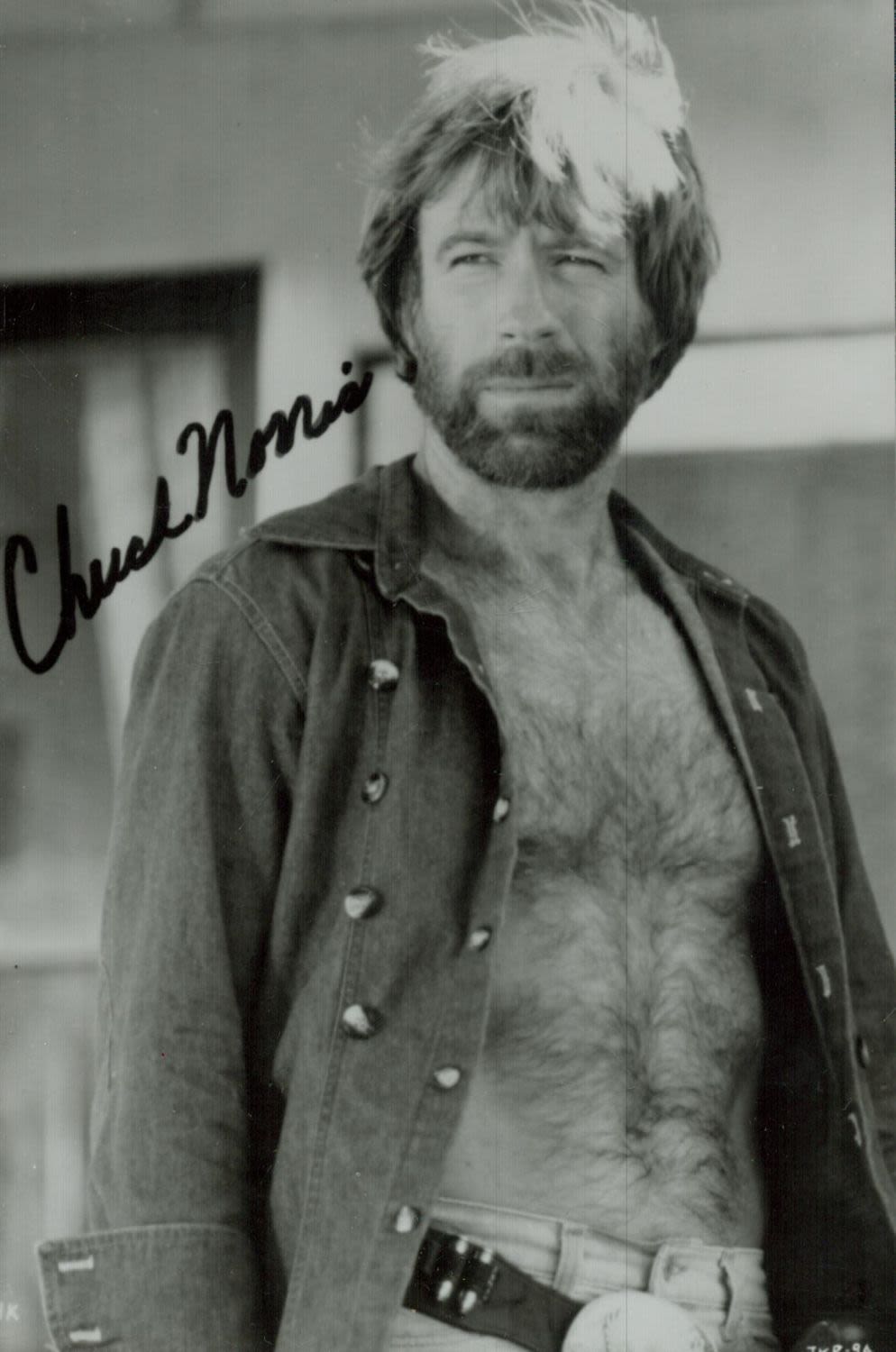 Lot 243: Chuck Norris signed 6x4inch black and white photo....