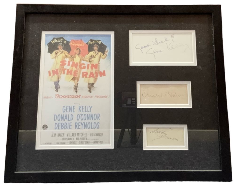 Lot 55: Gene Kelly, Donald O`Connor & Debbie Reynolds mounted...