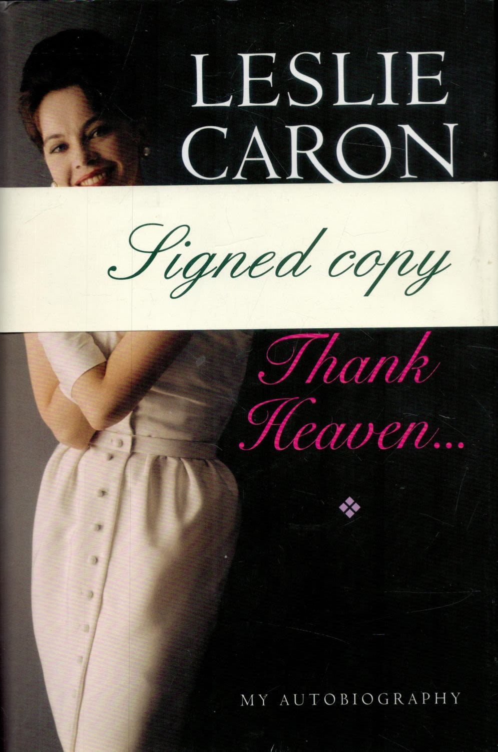 Lot 152: Leslie Caron signed Thank Heaven hardback book. Signed...