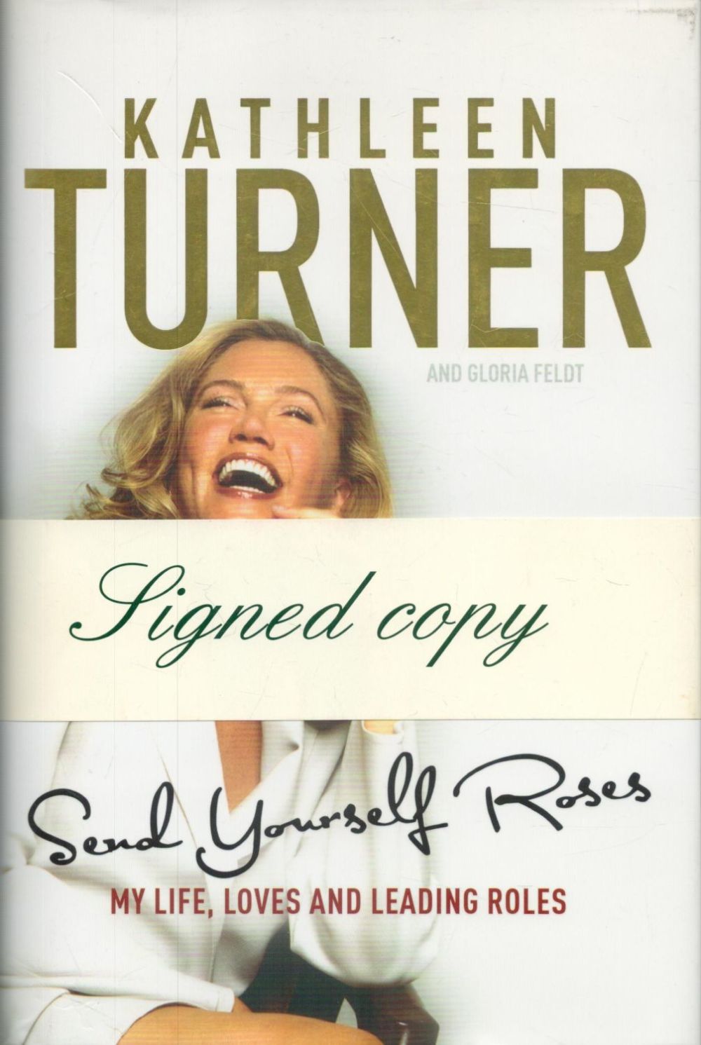 Lot 156: Kathleen Turner signed Send yourself roses hardback book....