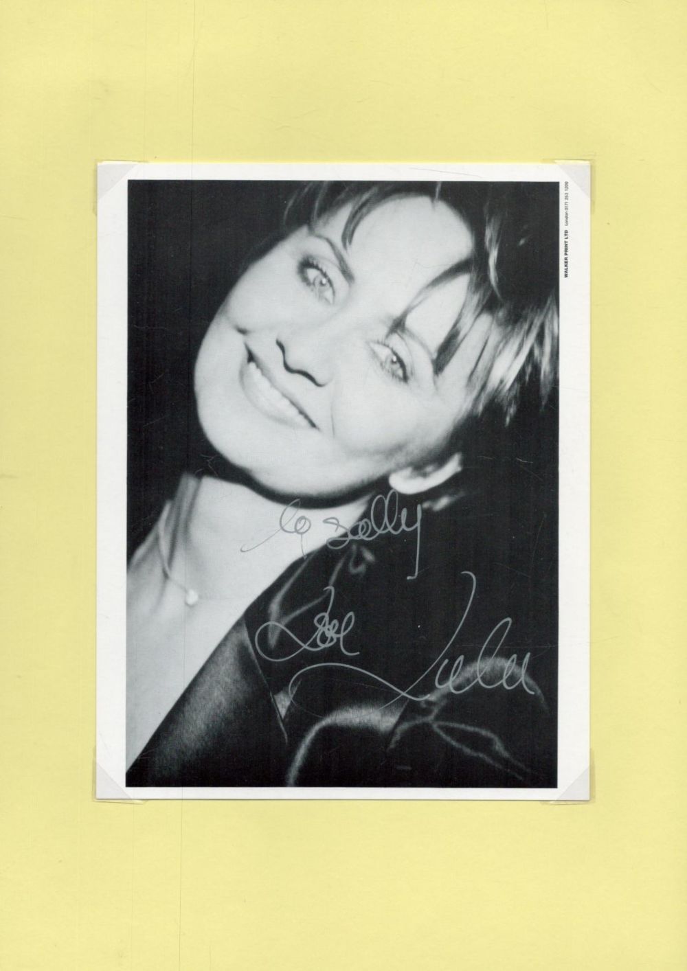 Lot 257: Lulu signed 8x6 inch black and white photo....