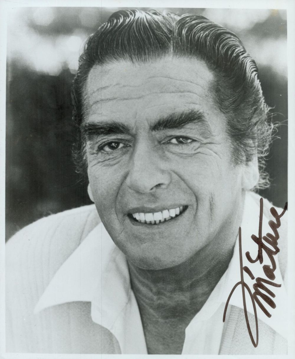 Lot 332: Victor Mature signed 10x8 inch black and white...