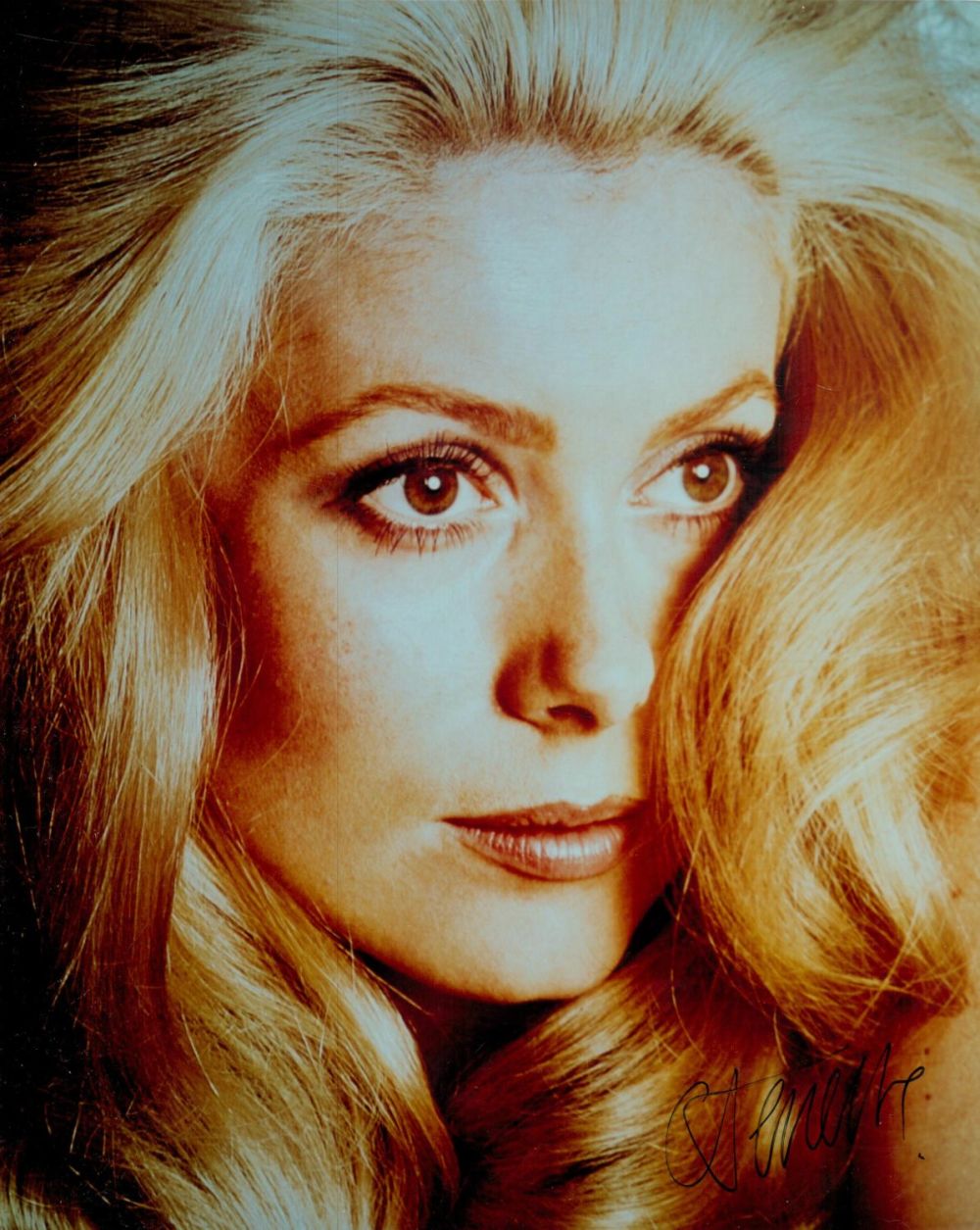 Lot 334: Catherine Deneuve signed 10x8 inch colour photo. Good...