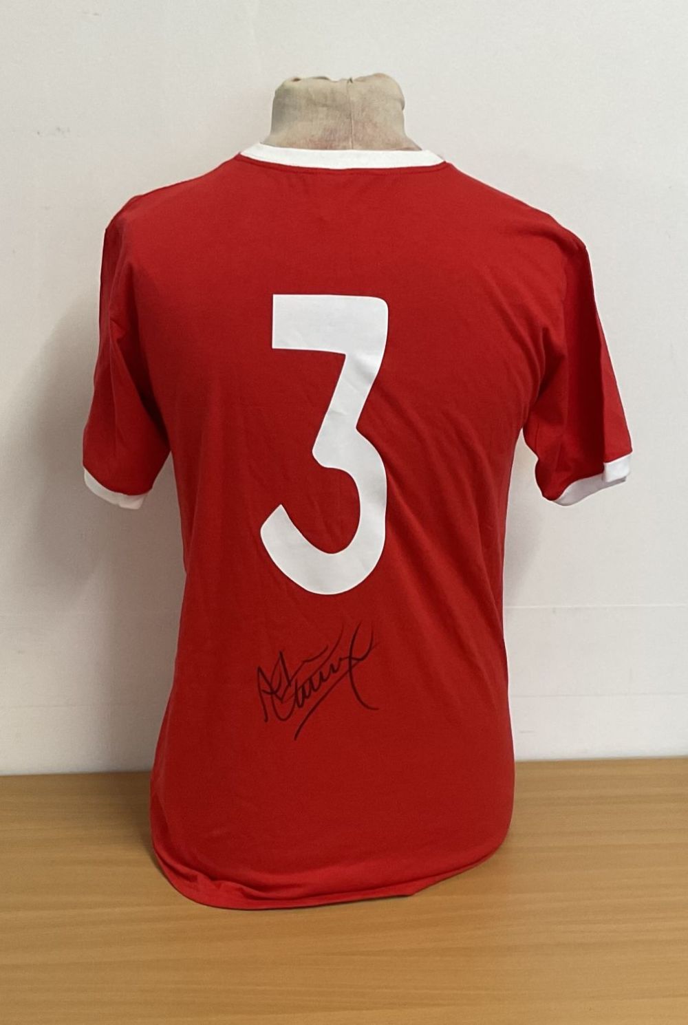 Lot 380: Alan Kennedy signed red shirt, size M, number...