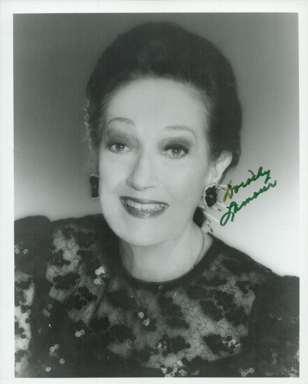 Lot 426: Dorothy Lamour signed 10x8 inch black and white...