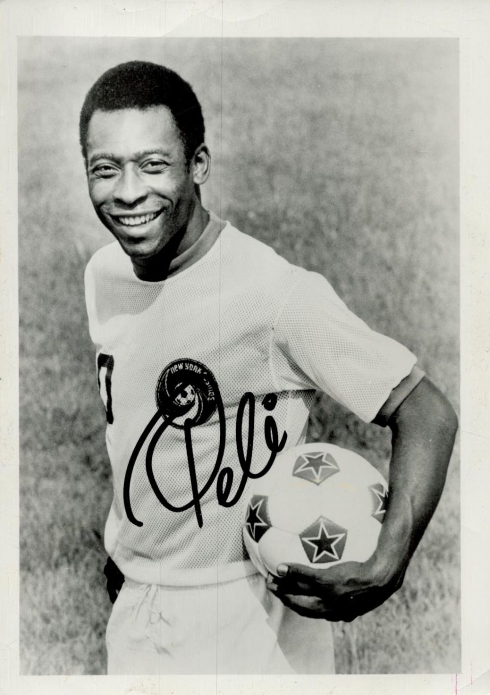 Lot 484: Pele signed 7x5 inch black and white photo...
