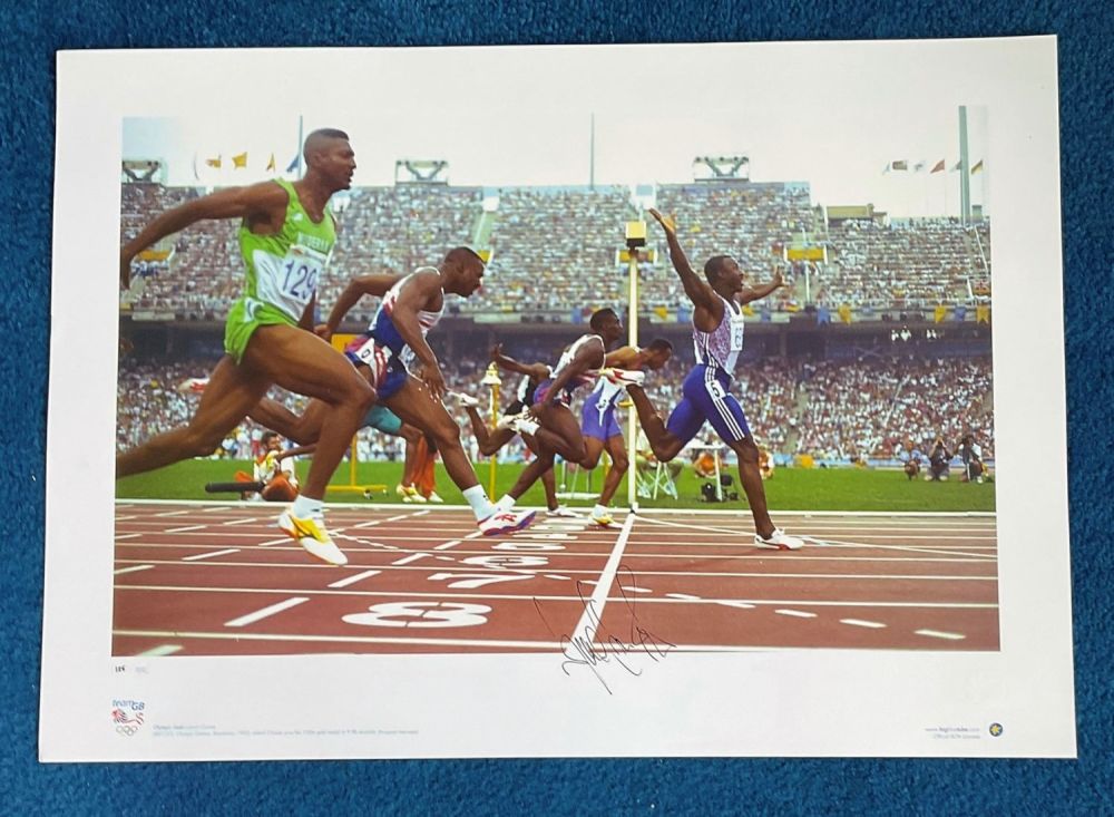 Lot 535: Linford Christie signed 22x16 colour Team GB Olympic...