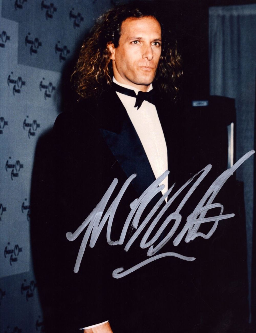 Lot 659: Michael Bolton signed 10x8 inch colour photo. Good...