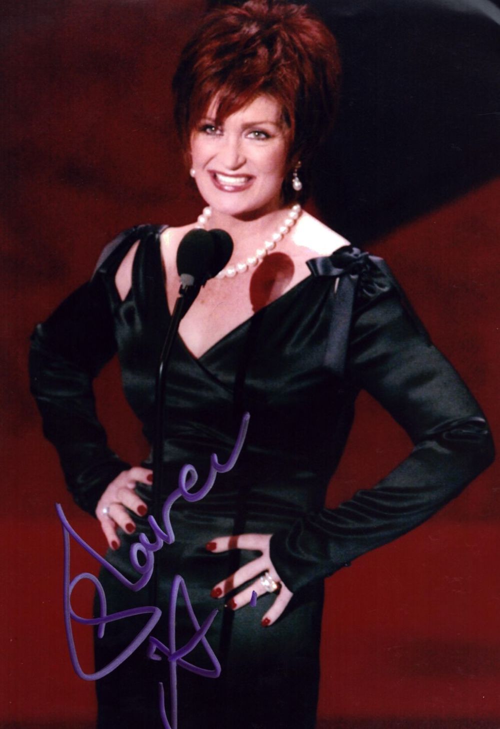 Lot 691: Sharon Osbourne signed 12x8 inch colour photo. Good...