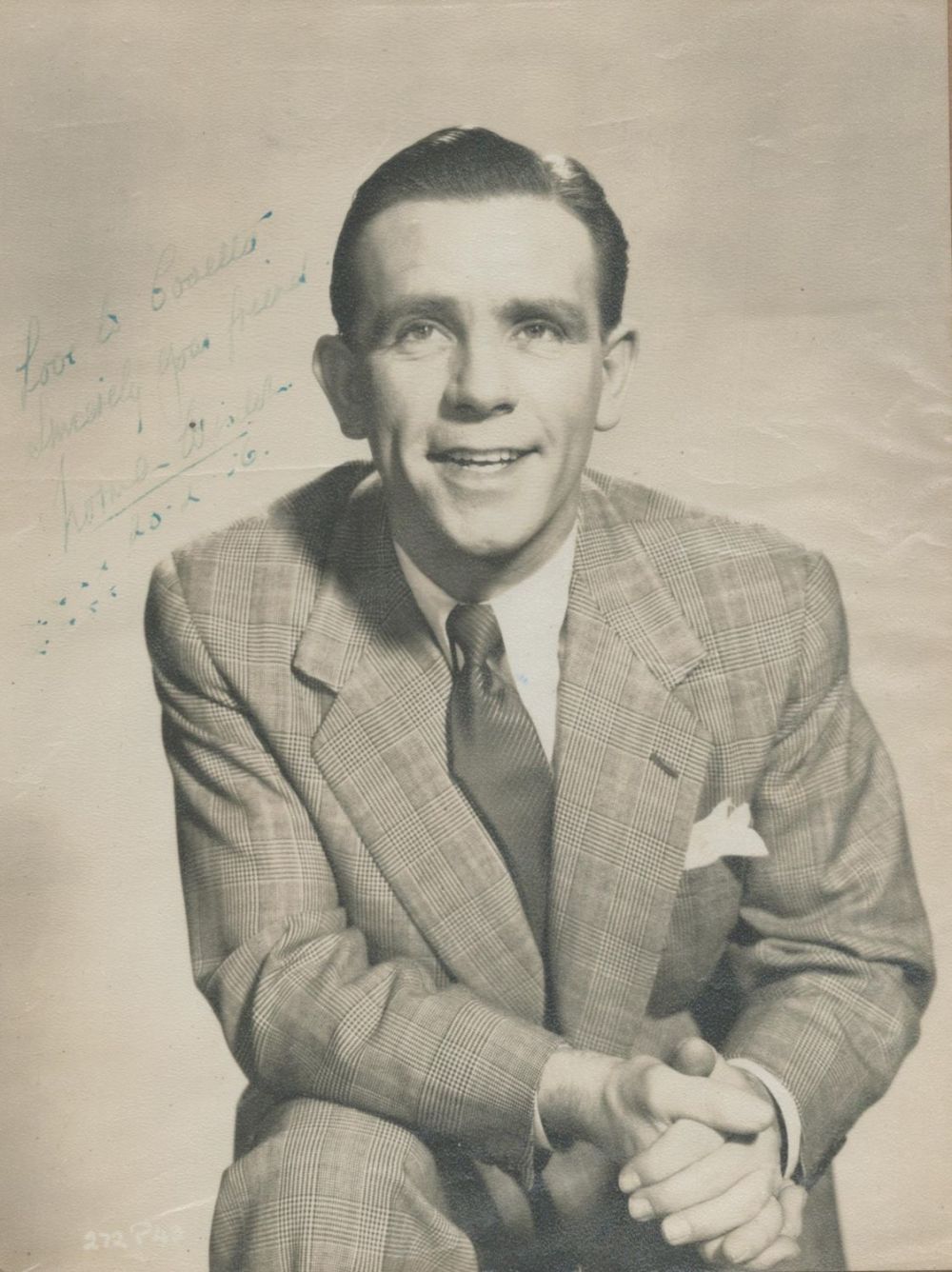 Lot 150: Norman Wisdom signed 10x8inch vintage photo. Slightly faded....