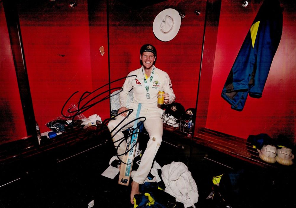 Lot 239: Steve Smith signed 12x8 inch photo pictured celebrating...